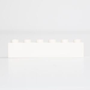 Single white LEGO® brick on white background